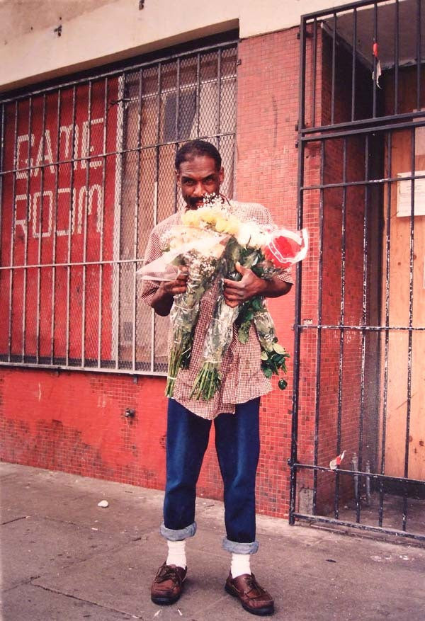 DAVE SCHUBERT - Man with flowers 6th St. 2002